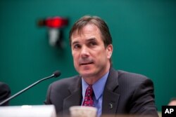 FILE - Michigan Department of Health and Human Services Director Nick Lyon testifies on Capitol Hill in Washington, April 13, 2016.
