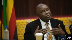 FILE - ZANU-PF spokesperson Christopher Mutsvangwa, shown here at a press conference in Harare, Zimbabwe, on Aug. 27, 2023, raised criticism from opposition parties and human rights groups on Aug. 20, 2024, when he laughed during a briefing about the country detaining activists.