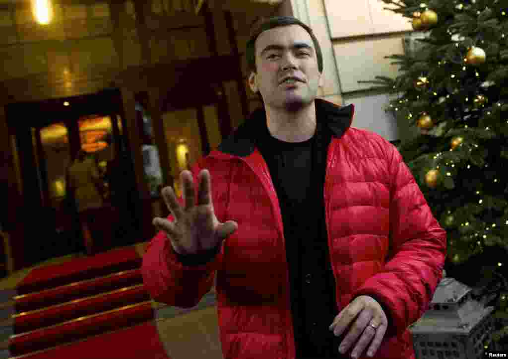 Pavel Khodorkovsky, son of Russian former oil tycoon Mikhail Khodorkovsky, speaks to the media outside of the Adlon Hotel in Berlin, Germany, Dec. 21, 2013.