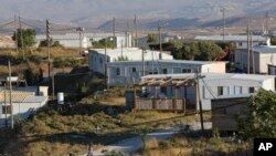 FILE - Amona, an unauthorized Israeli outpost in the West Bank, is seen east of the Palestinian town of Ramallah, Nov. 16, 2016. 