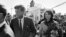 This Nov. 22, 1963 file photo shows President John F. Kennedy and his wife Jacqueline Kennedy upon their arrival at Dallas Airport shortly before President Kennedy was assassinated. 