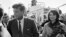 This Nov. 22, 1963 file photo shows President John F. Kennedy and his wife Jacqueline Kennedy upon their arrival at Dallas Airport shortly before President Kennedy was assassinated. 