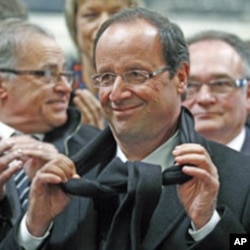 Francois Hollande visits the SAFRA industrial rail body factory on a campaign trip in Albi, France, April 16, 2012.