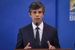 Brazil's newly-named Brazil Health Minister Nelson Teich speaks during his swearing-in ceremony at Planalto palace in Brasilia, Brazil, Friday, April 17, 2020.