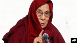 FILE - The Dalai Lama speaks at the Gandantegchinlen Monastery during a visit to Ulaanbaatar, Mongolia, Nov. 23, 2016.