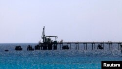 A general view shows pipelines at the Zueitina oil terminal in Zueitina, about 120 km (75 miles) west of Benghazi, Libya, July 18, 2013.