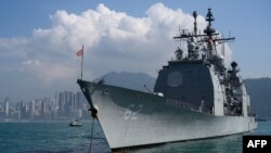 The U.S. Navy's USS Chancellorsville guided missile cruiser is seen anchored during a joint port visit with the USS Ronald Reagan in Hong Kong, Nov. 21, 2018.