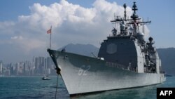 The U.S. Navy's USS Chancellorsville guided missile cruiser is seen anchored during a joint port visit with the USS Ronald Reagan in Hong Kong, Nov. 21, 2018.