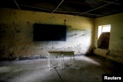 Desks are seen at an abandoned school in the town of Malakal, in the Upper Nile state of South Sudan, Sept. 8, 2018
