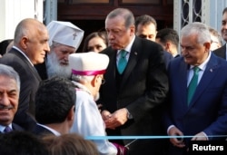 Turkish President Tayyip Erdogan and Bulgaria's Prime Minister Boyko Borissov attend re-opening of the St. Stefan Bulgarian Orthodox Church in Istanbul, Jan. 7, 2018.