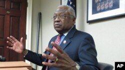 FILE - U.S. Rep. James Clyburn, D-S.C., talks to reporters on Thursday, April 2, 2015, in Columbia, S.C.