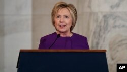 Former Secretary of State Hillary Clinton speaks during a ceremony to unveil a portrait of Senate Minority Leader Harry Reid, D-Nev., on Capitol Hill, Dec. 8, 2016, in Washington.