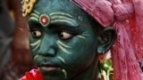 An Indian boy with his face painted participates in a procession on the occasion of Chandan Yatra festival in Puri, 65 kilometers (40 miles) from the eastern Indian city of Bhubaneswar. Chandan Yatra means Sandalwood Voyage, where devotees smear the deities of the Lord with cooling sandalwood paste.
