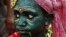 An Indian boy with his face painted participates in a procession on the occasion of Chandan Yatra festival in Puri, 65 kilometers (40 miles) from the eastern Indian city of Bhubaneswar. Chandan Yatra means Sandalwood Voyage, where devotees smear the deities of the Lord with cooling sandalwood paste.