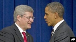 President Barack Obama (r) and Canadian Prime Minister Stephen Harper at the White House complex Dec. 7, 2011.