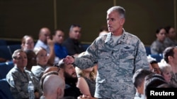 FILE - Lt. Gen. Jay Silveria, superintendent of the U.S. Air Force Academy, discusses his goals and priorities to an audience of Total Force Airmen at the United States Air Force Academy in Colorado, Aug.17, 2017. 