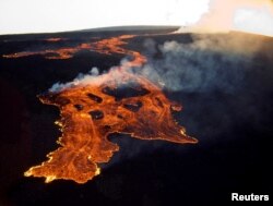 FILE - The Mauna Loa volcano on the island of Hawaii is shown in this March 25, 1984 handout photo provided by the U.S. Geological Survey, and released to Reuters on June 19, 2014. (U.S. Geological Survey/Handout via Reuters)