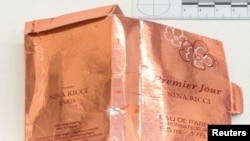 FILE - Packaging for a counterfeit bottle of perfume that was recovered after Dawn Sturgess was poisoned by the Soviet-era Novichok nerve agent is seen in an image handed out by the Metropolitan Police in London, Britain, Sept. 5, 2018.