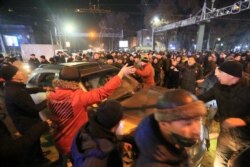 Protesters attend a rally in Almaty, Jan. 4, 2022.