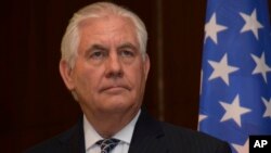 Menteri Luar Negeri Rex Tillerson dalam konferensi pers di Abuja, Nigeria, 12 Maret 2018.