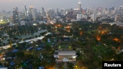 FILE - Anti-government protesters's tents are set up inside Lumpini Park, the main protest site in Bangkok, Mar. 4, 2014.