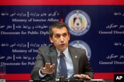 Sediq Sediqi, spokesman for the Afghan interior ministry, speaks with news media about a militant pre-dawn attack in Kunduz, at the interior ministry in Kabul, Afghanistan, Sept. 28, 2015.