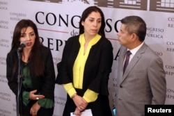 Lawmakers from the Popular Force Party (Partido Fuerza Popular) Alejandra Aramayo, Ursula Letona and Luis Galarreta speak to the media after Peru's President Martin Vizcarra asked the Congress for a new vote of confidence in his Cabinet in Lima, Peru, Sep