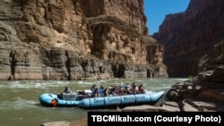 Rafting down the Colorado River is a popular way to see the Grand Canyon up close.