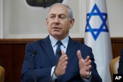 FILE - Israeli Prime Minister Benjamin Netanyahu chairs the weekly cabinet meeting at his office in Jerusalem, Jan. 7, 2018.