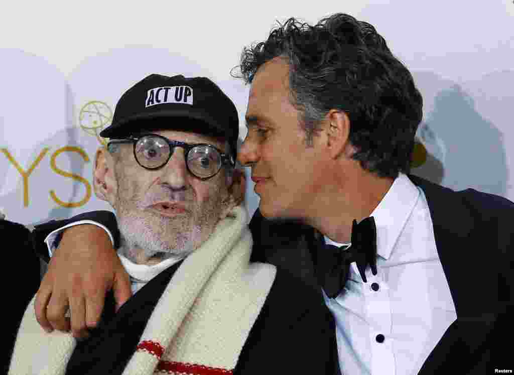 Playwright Larry Kramer and actor Mark Ruffalo pose together after winning the Outstanding Television Movie award for HBO&#39;s &quot;The Normal Heart&quot; at the 66th Primetime Emmy Awards in Los Angeles, Aug. 25, 2014.