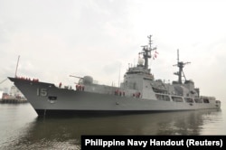 FILE - The U.S. Hamilton-class cutter, Manila's largest Navy warship, was sent to check on Chinese fishing boats after a Philippines Navy surveillance plane spotted the Chinese vessels in the Scarborough Shoal, April 8, 2012.
