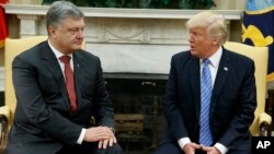 President Donald Trump speaks during a meeting with Ukrainian President Petro Poroshenko in the Oval Office of the White House, June 20, 2017, in Washington. 