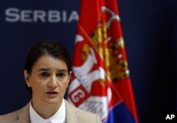 FILE - Serbian Prime Minister Ana Brnabic speaks during a press conference in Belgrade, Serbia, Nov. 21, 2017.