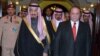 A handout photo released by the Press Information Department (PID) shows Pakistani Prime Minister Muhammad Nawaz Sharif (R) welcoming Saudi Crown Prince Salman bin Abdul Aziz Al- Saud at the Prime Minister's House in Islamabad. Feb. 17, 2014 (AFP)