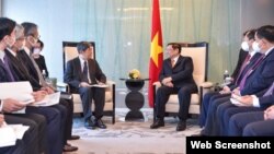 Thủ tướng Việt Nam Phạm Minh Chính và ông Kitaoka Shinichi, Chủ tịch JICA), 24/11/2021. Photo VietnamPlus