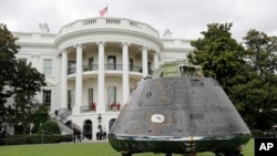 An Orion crew module, part of NASA's Space Launch System (SLS), is on display on the South Lawn of the White House in Washington at the "Made in America", July 23, 2018.