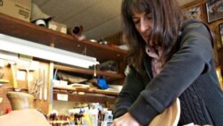 Carving patterns into leather is a skill that saddle maker Nancy Martiny first learned as a teenager while watching her father tool leather