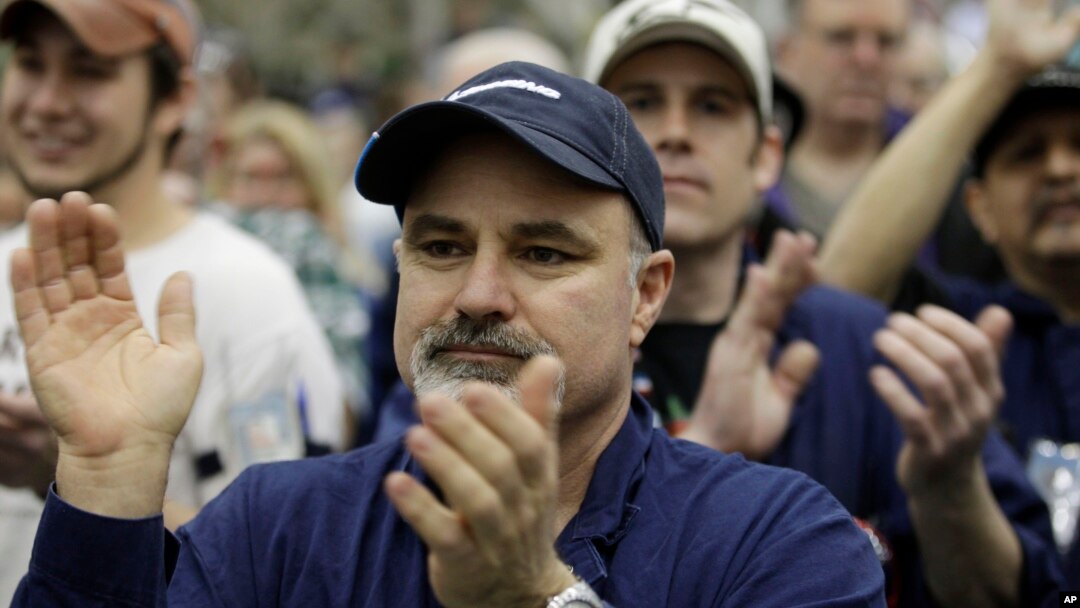 On Feb. 25, 2011, Boeing Co. workers applaud during a rally at Boeing's 767 assembly plant in Everett, Wash. The rally was held to celebrate Boeing winning a $35 billion Air Force contract.