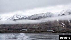 Low clouds are seen in the Kings Bay of Ny-Alesund, Svalbard, Norway, Oct. 12, 2015. 