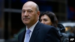 FILE - Then-Goldman Sachs Chief Operating Officer Gary Cohn leaves Trump Tower in New York, Dec. 13, 2016. 