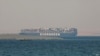 El Evergreen, un buque de carga operado por la compañía naviera Evergreen, es visto anclado en el Gran Lago Amargo de Egipto, el 30 de marzo de 2021, después de estar bloqueando el Canal de Suez a principios de marzo.