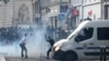 TOPSHOT - Protesters clash with CRS riot police in Marseille, southern France on June 30, 2023, over the shooting of a teenage driver by French police in a Paris suburb on June 27.