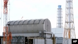 The Unit 3 reactor covered with protective housing at the Fukushima Daiichi nuclear power plant, run by Tokyo Electric Power Company Holdings (TEPCO), is seen in Okuma town, Japan, Feb. 20, 2025.