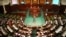 FILE - Lawmakers are seen assembled in Tunisia's parliament in Tunis, Dec. 2, 2014.