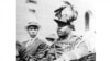 FILE - In this Aug. 1922 photo, Marcus Garvey is shown in a military uniform as the "Provisional President of Africa" during a parade on the opening day of the annual Convention of the Negro Peoples of the World in Harlem borough of New York. 