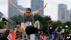 Eric Johnson competes in the men's long jump during the U.S. Paralympics Team Trials in Charlotte, N.C., July 1, 2016.