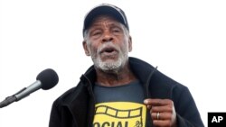 FILE - Actor Danny Glover speaks at the A.C.T. To End Racism rally, Washington, April 4, 2018.