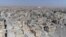 This Thursday, Oct. 19, 2017 frame grab made from drone video shows damaged buildings in Raqqa, Syria two days after Syrian Democratic Forces said that military operations to oust the Islamic State group have ended and that their fighters have taken full control of the city.
