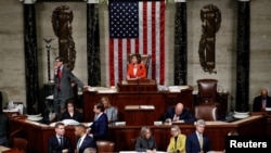 Speaker of the House Nancy Pelosi presides over the U.S. House of Representatives vote on a resolution that sets up the next steps in the impeachment inquiry of U.S. President Donald Trump on Capitol Hill in Washington, D.C.