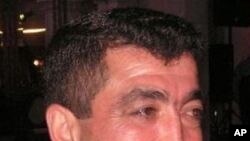 2012年11月22日，驻阿富汗喀布尔的美国军人排队等待享用感恩节大餐。